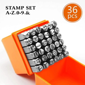 36-piece metal stamp set with letters and numbers in an orange storage box
