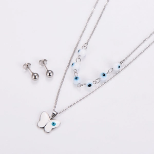 Detail of silver double-layer necklace with blue evil eye beads and butterfly pendant