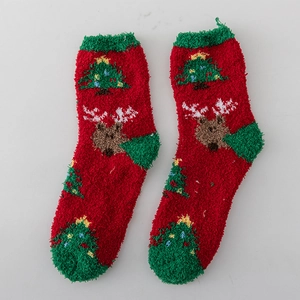 Thick coral fleece Christmas socks featuring red reindeer and green tree designs