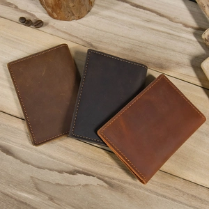 Vintage crazy horse leather coin pouch and card holder in brown, dark brown, and black