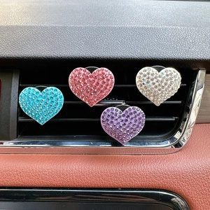 Sparkling diamond heart-shaped car air vent aromatherapy clips in four vibrant colors