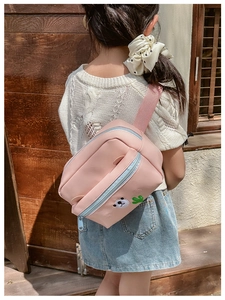 Pink children's crossbody bag with cute bear embroidery and adjustable strap