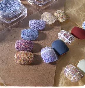 Macro detail of Sugar Series nail art powder set with six colorful sandy texture glitters