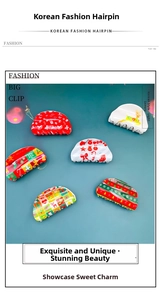 Detail of six festive Christmas hair claws with reindeer and gingerbread man prints