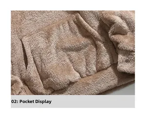 Detail of the large kangaroo pocket on this thick fleece hoodie in warm brown plush