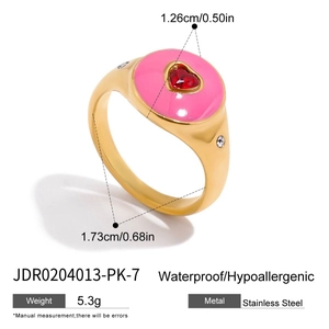 Detailed view of pink enamel heart ring with gold band and size dimensions guide