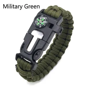 Army green paracord survival bracelet with compass, whistle and fire starter feature