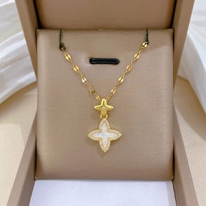 Luxurious titanium steel necklace with clover pendant featuring mother of pearl and diamonds