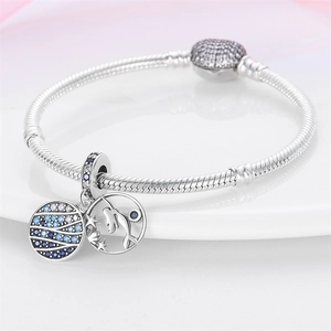 Silver snake chain bracelet with blue gemstone ocean charms and shell pendants