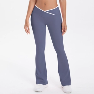 Close-up of V-shaped crossover high waist on flared yoga pants with white contrast piping