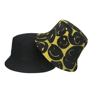 Classic black and graffiti-style smiley face pattern cotton bucket hats for sun protection