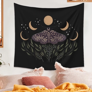 Detail of bohemian moth tapestry featuring moon phases on a white bedroom wall