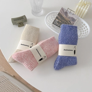 Thick wool knit crew socks in beige pink and purple for winter warmth and comfort