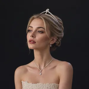 Elegant bridal jewelry set with sparkling tiara, necklace and earrings on model