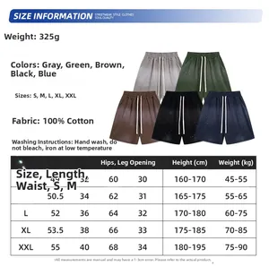 Guía de tallas para pantalones cortos de algodón vintage con manchas de tinta y medidas