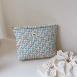 Quilted blue plaid makeup bag with floral bow pattern and simple wish label