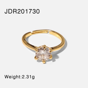 Detail of a 2.31g gold ring featuring a clear zircon in a classic six-prong setting