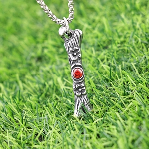 Retro stainless steel plum blossom bone pendant with red zircon for men's hip hop style