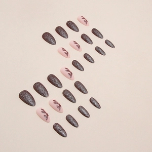 Sparkling red velvet almond press-on nails with glitter matte finish and leaf patterns