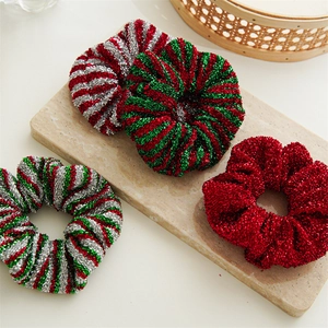 Set of four festive Christmas scrunchies in red, green and silver glittery fabric