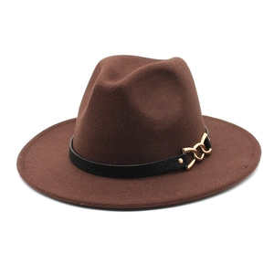 Detail of wide brim wool fedora with decorative black band and gold chain buckle