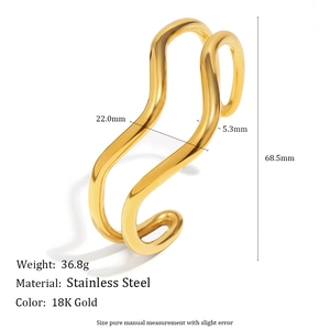 Minimalist 18K gold-plated stainless steel twisted bangle with wavy abstract design