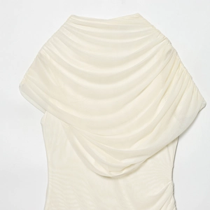 Elegant ivory mesh dress featuring a layered pleated design and high-quality sheer fabric
