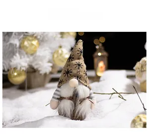 Close-up of Christmas gnome with snowflake knit hat and white beard in winter scene