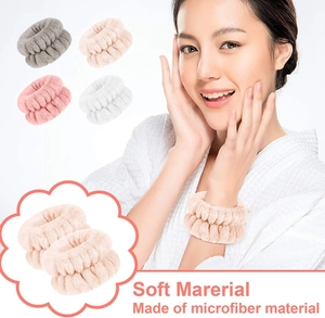 Detail of soft microfiber wrist washbands in four colors showing absorbent plush texture