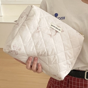 Quilted white cotton storage bag with cute rabbit prints and diamond patterns