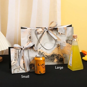 Gray marble gift bags with gold foil, satin bows and handles, large and small sizes