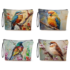 Organisateurs en toile avec imprimé oiseau et fleurs, fermeture éclair et dragonne noire