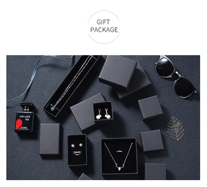 Detail of luxury minimalist matte black gift boxes for rings and jewelry sets