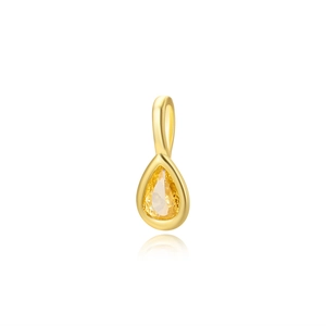 Close-up of teardrop 18k gold plated pendant with a yellow pear-cut crystal gemstone