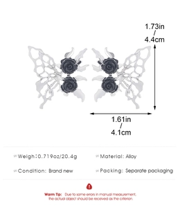 Detail of gothic silver butterfly earrings with black rose carving and size dimensions