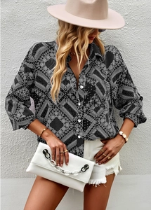 Detail of bohemian paisley print on women's long sleeve shirt with button-up collar