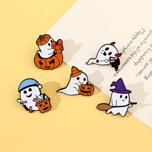 Set of five cute Halloween enamel pins featuring ghosts and pumpkins on yellow background