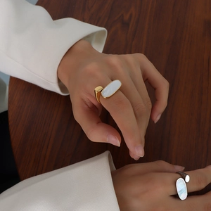 Chic 18k gold plated stainless steel ring featuring an oval white mother of pearl inlay