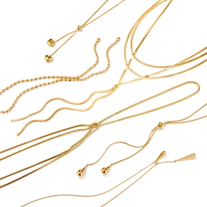 Collection of golden stainless steel Y-shaped chain necklaces with heart pendants on white background