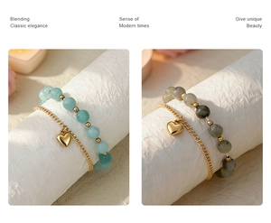 Detail of magnetic couple bracelets featuring blue and grey beads with heart pendants