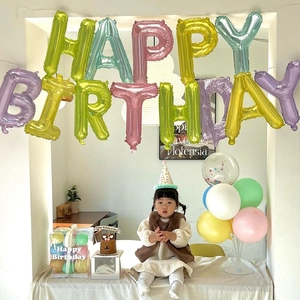Macaron Happy Birthday letter balloon set in a festive scene for party decorations