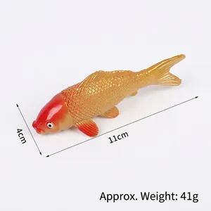 Lifelike PVC koi fish keychain model in orange and red with 11cm length dimensions