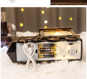 Detailed base of vintage Christmas train lamp showing USB and battery power options