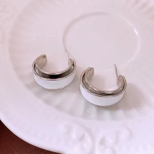Chic silver plated C-shaped hoop earrings with white enamel inlay for modern minimalist style