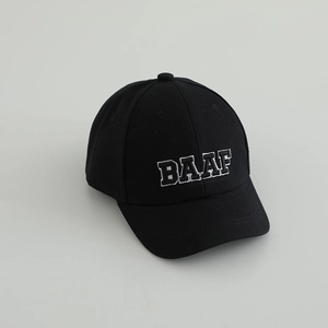 Detail of BAAF letter embroidery on black cotton baseball cap for kids with white outlines