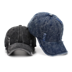 Distressed denim baseball caps in dark grey and blue with vintage ripped details