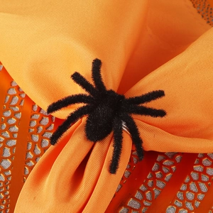Portatovagliolo a ragno nero per Halloween su tessuto arancione per tavola festiva