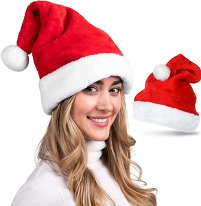 Close-up of soft plush texture on a classic red and white Christmas Santa hat