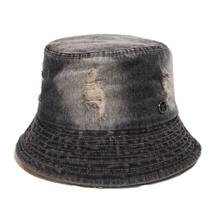 Distressed wash denim bucket hat with ripped details and sun protection for women
