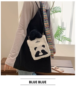 Macro shot of cute plush panda crossbody bag with soft faux fur and panda embroidery